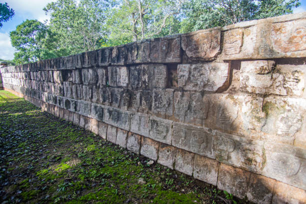istock Maya Engravings in the Ruins of Chichen Itza 1203628052