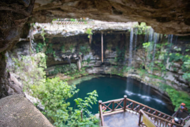 istock Saamal - beautiful Cenote in Mexico, near Chichen Itza 1203629248