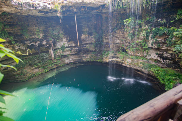 istock Saamal - beautiful Cenote in Mexico, near Chichen Itza 1203629341
