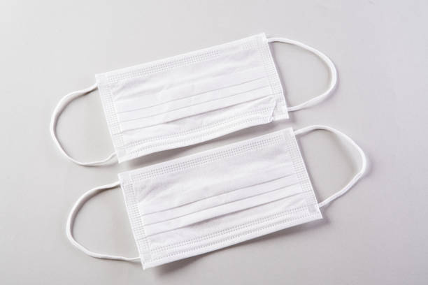 istock Protective face mask or medical mask. Medical protective shielding bandage. Protect Coronavirus and pm 2.5 mask. 1203630486