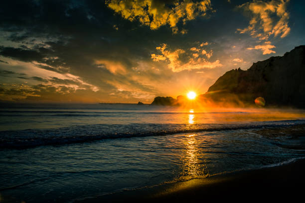 istock Amazing start to the day at the coast 1203637054