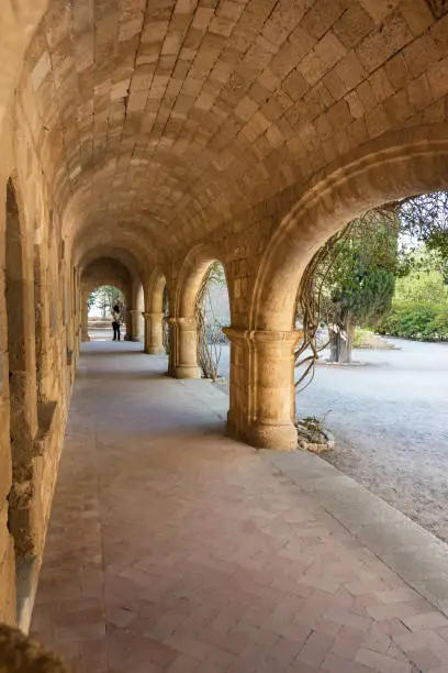 Column corridor with icons of Saints in Monastery of Filerimos on Acropolis of Ialyssos (Rhodes, Greece)