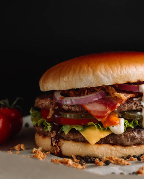 istock Perfect hamburger classic burger american cheeseburger with cheese, bacon, tomato and lettuce 1203642191
