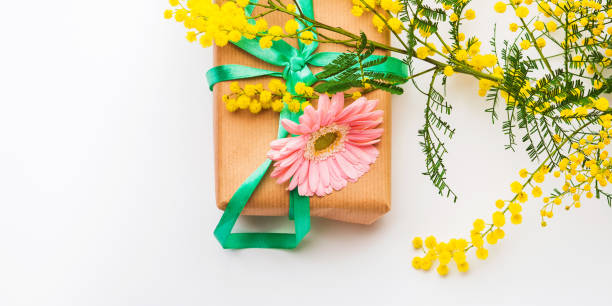 istock Womans day. Gift box with mimosa flowers 1203642193