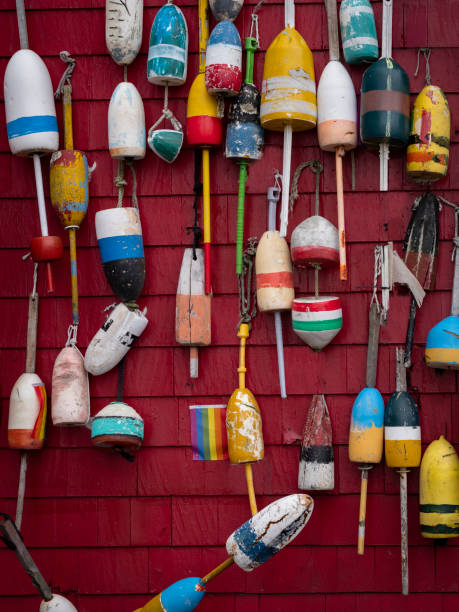 Lobster buoy collection on wall in Boston Harbor