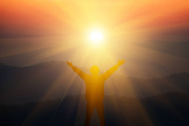 istock The man thanked God and raised his arm. 1203644963