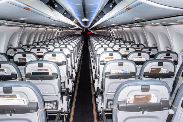 istock Commercial airplane, Passenger Cabin, Economy Class. 1203652757