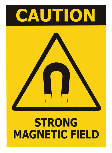 Strong Magnetic Field Caution Sign Isolated Text Label, Hazard Safety Attention, Danger Risk Warning Concept, Yellow Black Notice Vertical Adhesive Triangle Sticker Icon, Large Detailed Macro Closeup stock photo