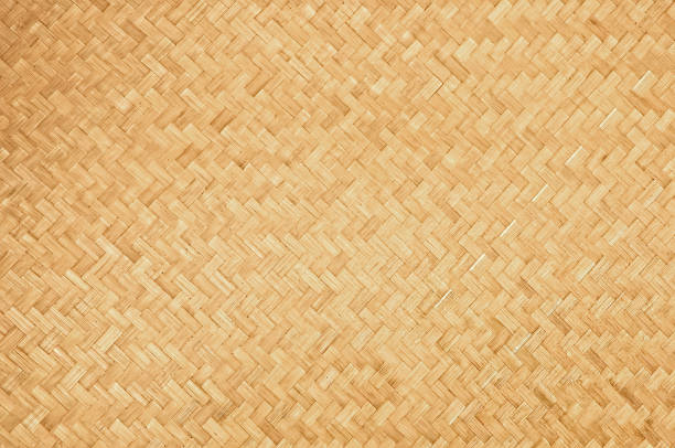 handwerk natürliche gewebte bambus textur hintergrund - woven bamboo wicker textured stock-fotos und bilder