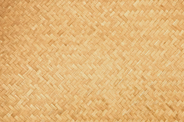 sfondo di trama di bambù intrecciato naturale artigianale - wicker textured bamboo brown foto e immagini stock