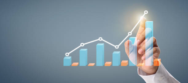 istock Businessman plan graph growth and increase of chart positive indicators 1203654639