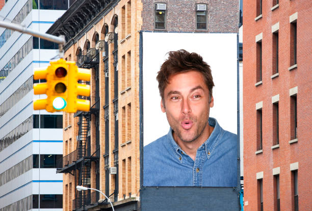 Billboard advertisement of man showing surprise.