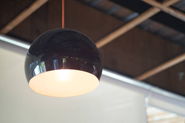 istock Black circle lamp decorated in a coffee shop 1203657993