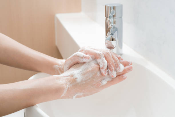 istock Asian woman washing hands 1203659992
