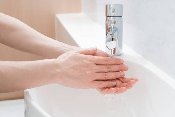 istock Asian woman washing hands 1203660051