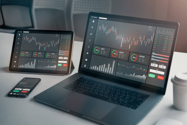 istock Stock exchange market concept, laptop and tablet, smartphone on the table with graphs analysis candle line in office room, diagrams on screen. 1203660810