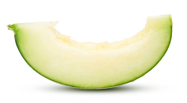 istock Ripe green melon slice isolated on white with clipping path. 1203661860