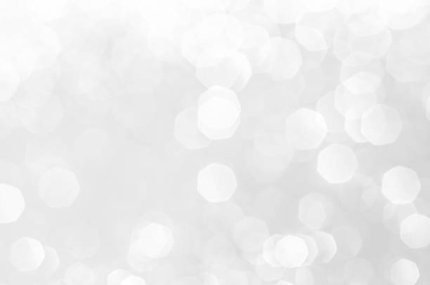 istock Abstract bokeh white,light grey,sliver colors de focused circular background.Night light season greeting elegance backdrop or artwork design for newyear,christmas sparkling glittering or special day. 1203664100