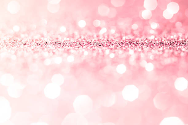 istock Pink gold, pink bokeh,circle abstract light background,Pink Gold shining lights, sparkling glittering Valentines day,women day or event lights romantic backdrop.Blurred abstract holiday background. 1203664111
