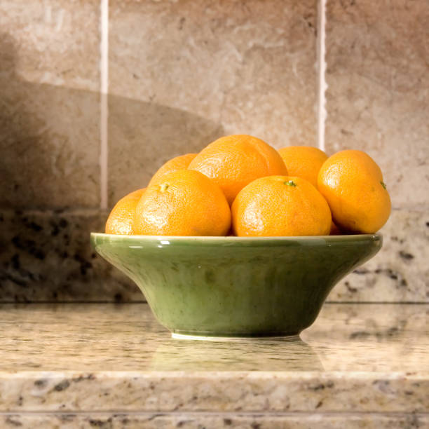 istock bowl of fresh tangerines 1203664314