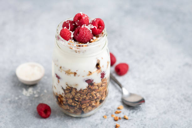 Yogurt with granola and raspberries