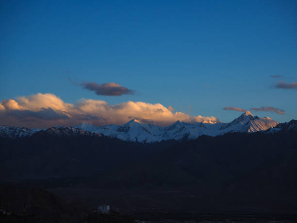 View of Stok Kangri at sunset The view of the Stok Kangri mountain range at sunset from Leh Palace in Ladakh region of North India stok kangri stock pictures, royalty-free photos & images
