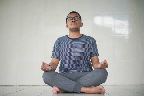 istock South East Asian Man Doing Yoga 1203677407