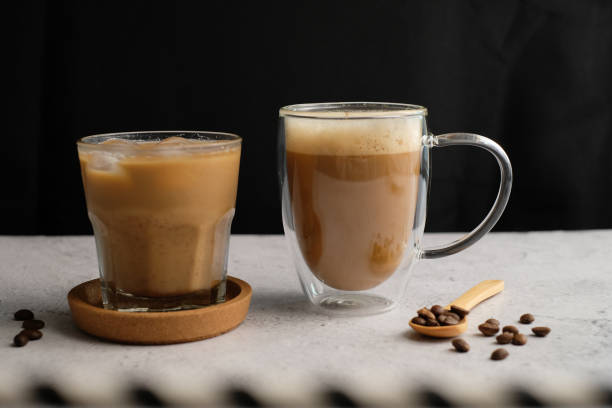 istock Coffee cup and beans top view with copyspace . flat lay latte for menu, background, banner and advertisement. brew caffeine drink and modern style. 1203679350