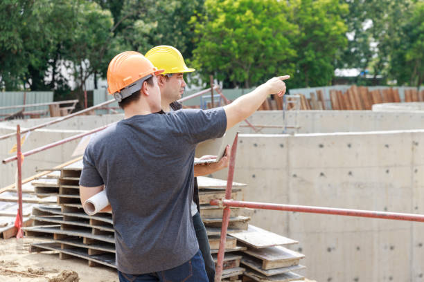 istock Construction concept of Engineer and Architect working at Construction Site with blue print 1203680531