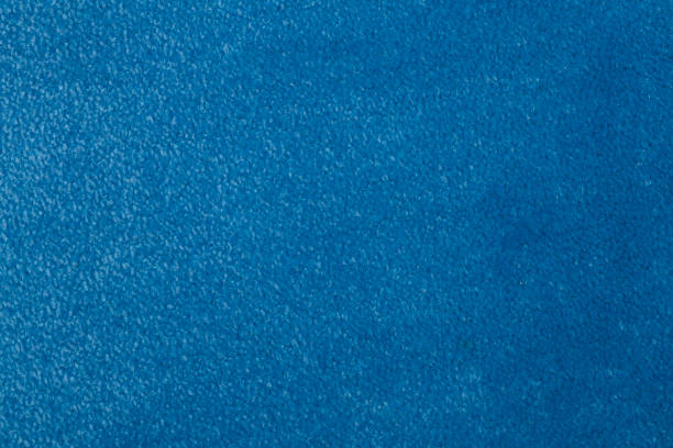 istock Carpet covering background. Pattern and texture of yellow carpet. Copy space 1203685519