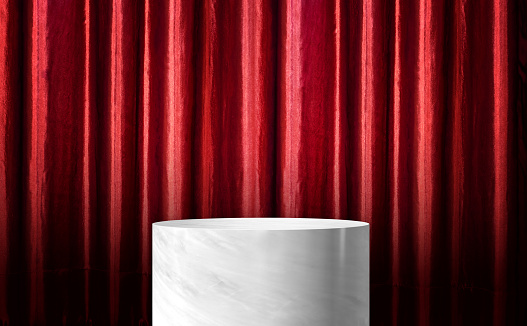 Product display glossy white marble cylinder stand with red curtain wall background.Banner mockup space for display of product design