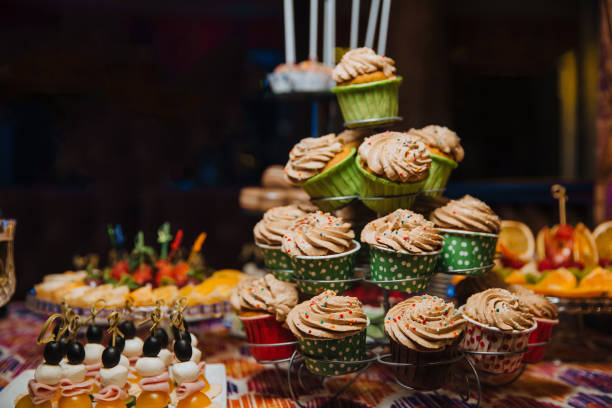 istock Freshly made cupcakes stand on a stand 1203690842