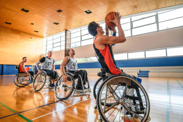 istock Wheelchair Basketball Player Taking a Shot During Practice 1203692503