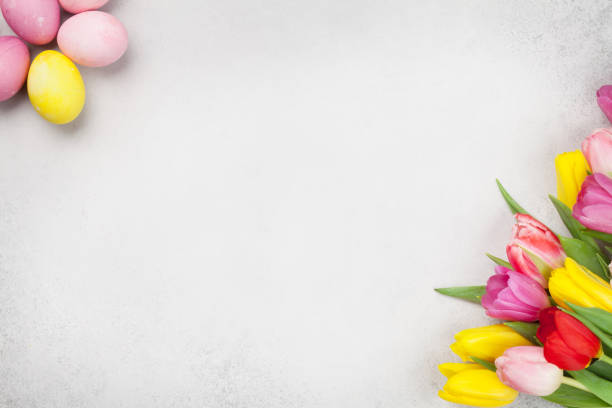 istock Easter greeting card with eggs and tulips 1203695469
