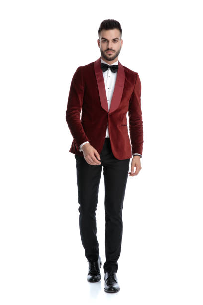 istock sexy young model in red velvet tuxedo walking 1203696507
