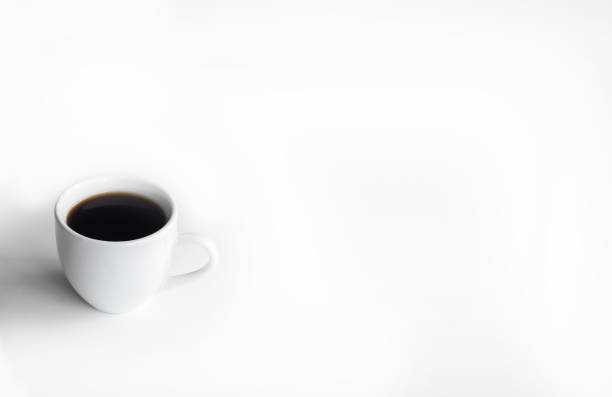 xícara branca de café em um pires branco com lugar para texto em uma vista superior branca - peppy - fotografias e filmes do acervo