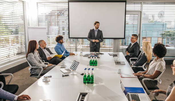 istock Business presentation in a board room! 1203697613
