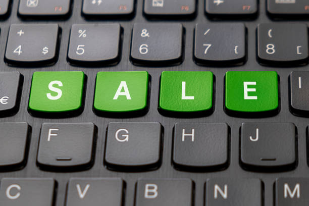 istock Sale written on the keyboard 1203698747