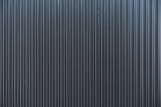 Dark grey Colorbond sheet metal fencing background texture
