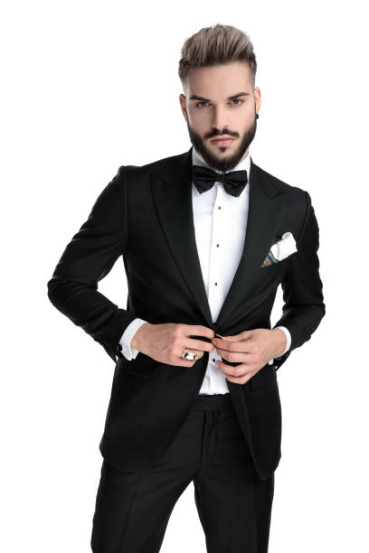 istock businessman standing and closing jacket with class 1203700811