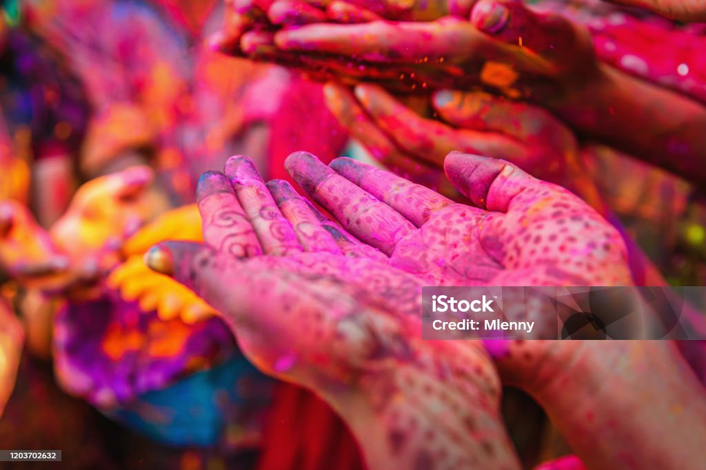 Holi Festival Jaipur India Colorful Hands Group of colorful Hands at Holi Festival in India, covered in colored powder. The spring festival, also known as Festival of Colours, is an ancient Hindu religious festival and mainly celebrated in India but has become popular in many other parts of the world. Jaipur, India, Asia. Holi Stock Photo