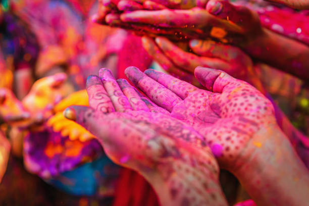 Holi Festival Jaipur India Colorful Hands Group of colorful Hands at Holi Festival in India, covered in colored powder. The spring festival, also known as Festival of Colours, is an ancient Hindu religious festival and mainly celebrated in India but has become popular in many other parts of the world. Jaipur, India, Asia. body paint photos stock pictures, royalty-free photos & images