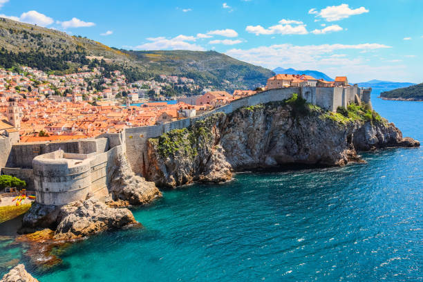 Panorama of the walled old town of Dubrovnik in Croatia Famous tourist and filming location. dubrovnik photos stock pictures, royalty-free photos & images