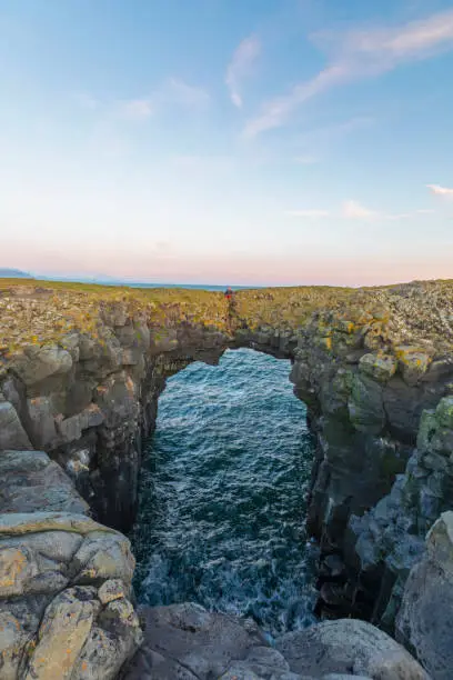 Photo of Gatklettur or Hellnar Arch is a famous, naturally formed stone arch on the Sn¶fellsnes Peninsula. Arnarstapi, Iceland