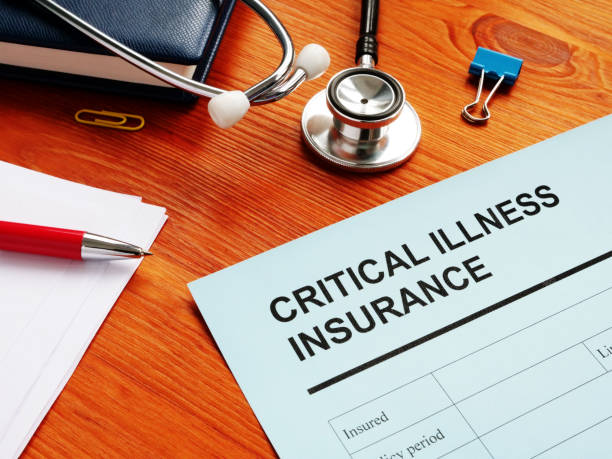 istock Critical Illness Insurance form and stethoscope. 1203706392
