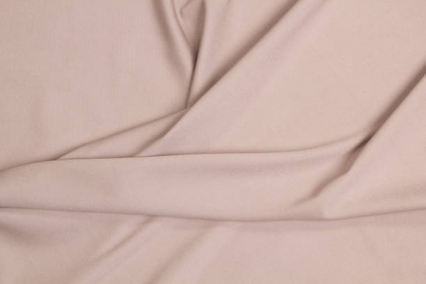istock Fabric jeans fold top view. Pink textile 1203707884