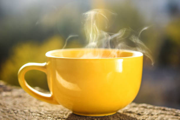 istock Coffee or tea cup  with white steam 1203710339