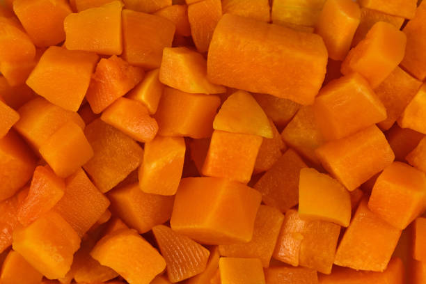 istock Cube shaped pices of raw red kuri squash 1203711140