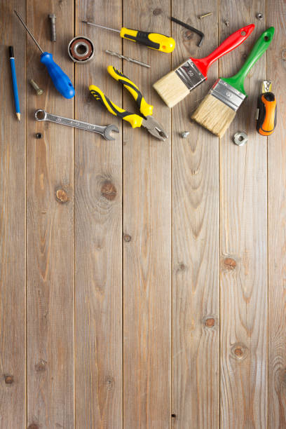 istock set of tools and instruments at wooden table background 1203712494