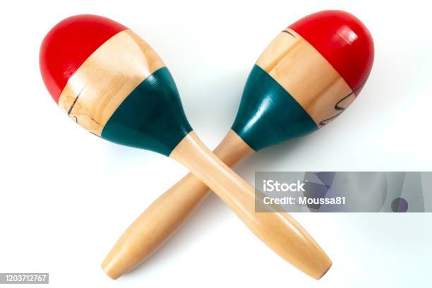 Caribbean And Latin Music And Traditional Musical Instruments Conceptual Idea With Wood Maracas Or Rumba Shakers Isolated On White Background With Clipping Path Cutout Stock Photo - Download Image Now